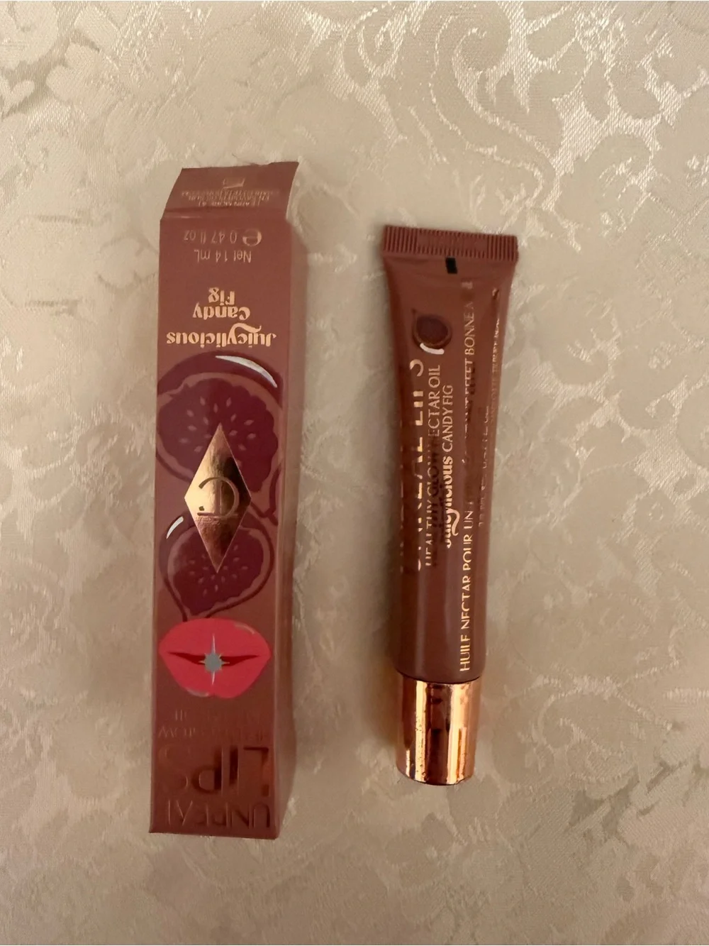 Charlotte Tilbury Unreal Lips pH-Powered Oil Lip Plumper Gloss 0.47 fl oz